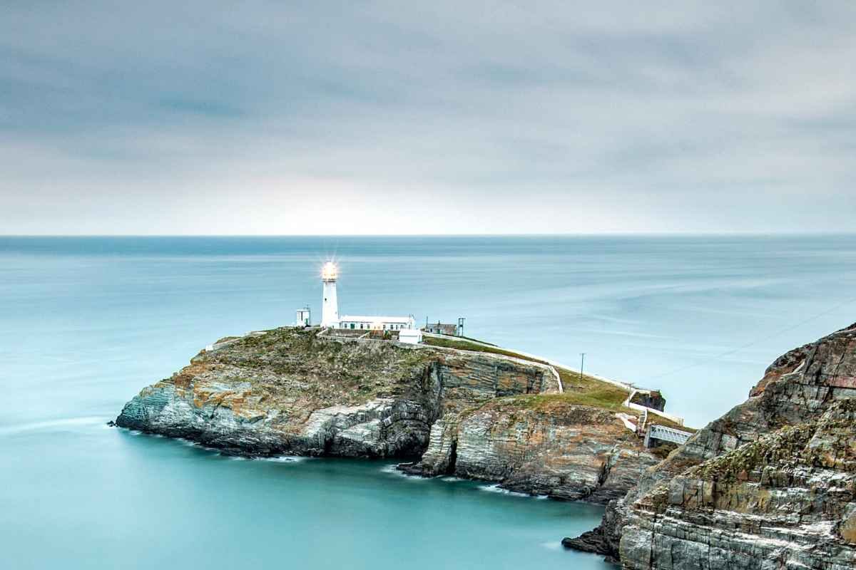 Lighthouse on a rocky island off the Holyhead coast in Wales